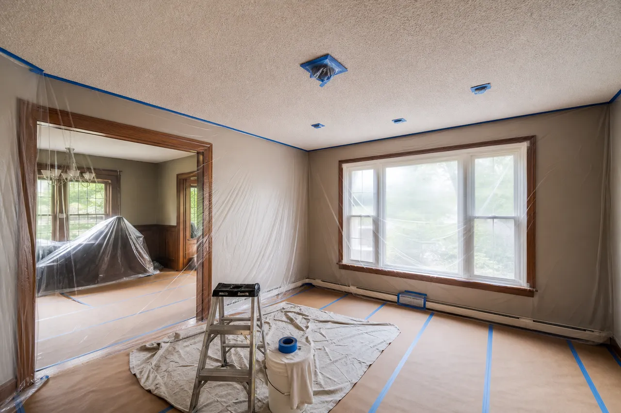 Dundas older home room protected before popcorn ceiling removal