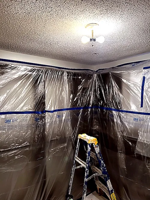 Level 5 skim coating during popcorn ceiling resurfacing